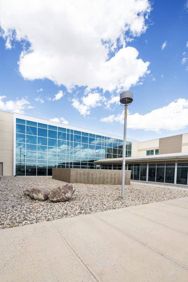 Modern hospital building exterior against the sky