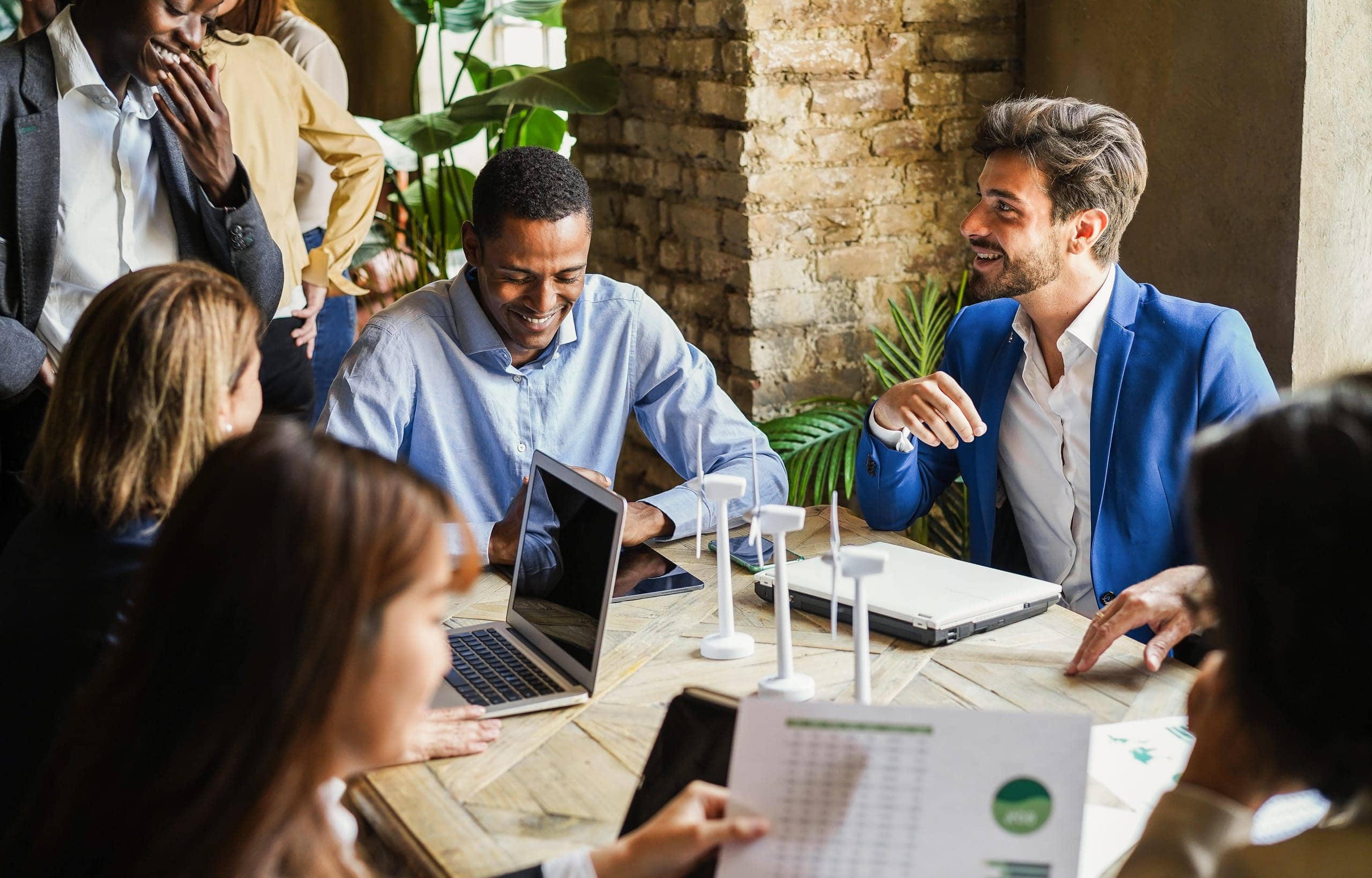 Independent insurance agents reviewing coverage options in a conference room