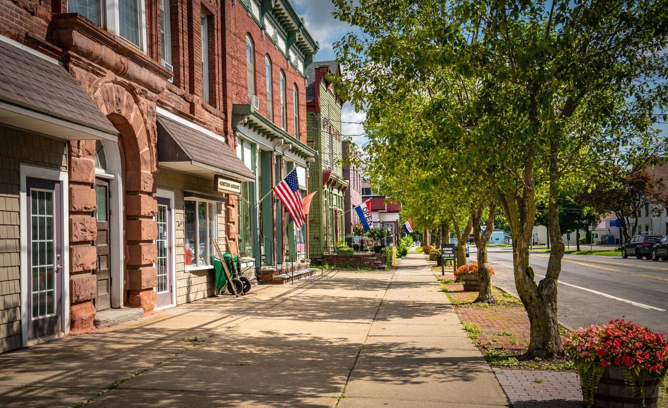 A small-town Main Street lined with local storefronts