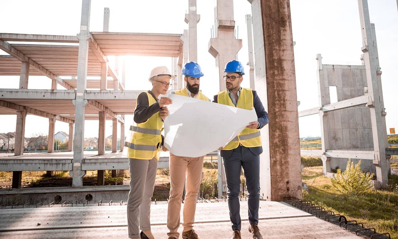 Workplace team reviewing safety and workers' compensation coverage