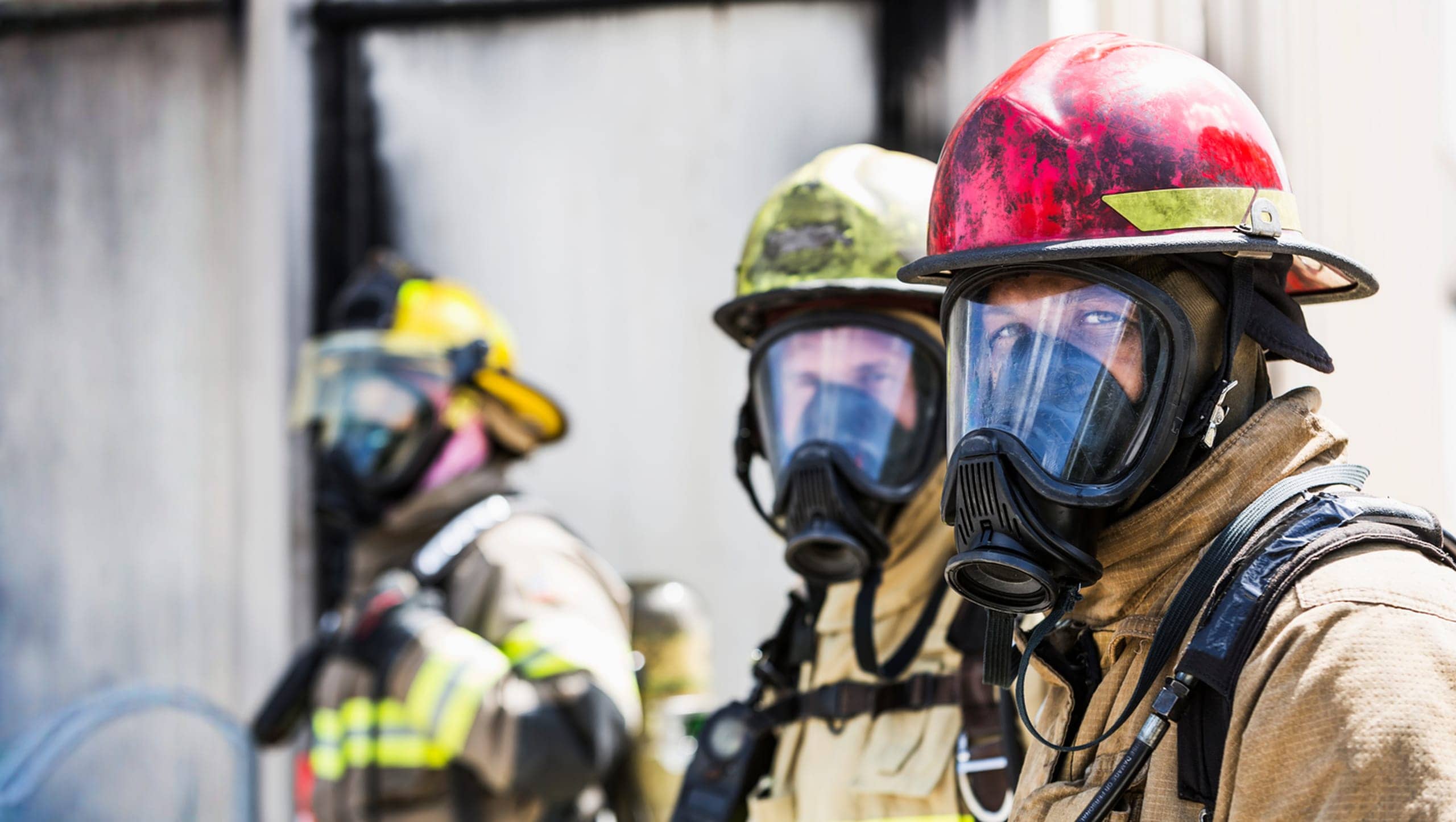 Emergency responders in protective gear during a response operation
