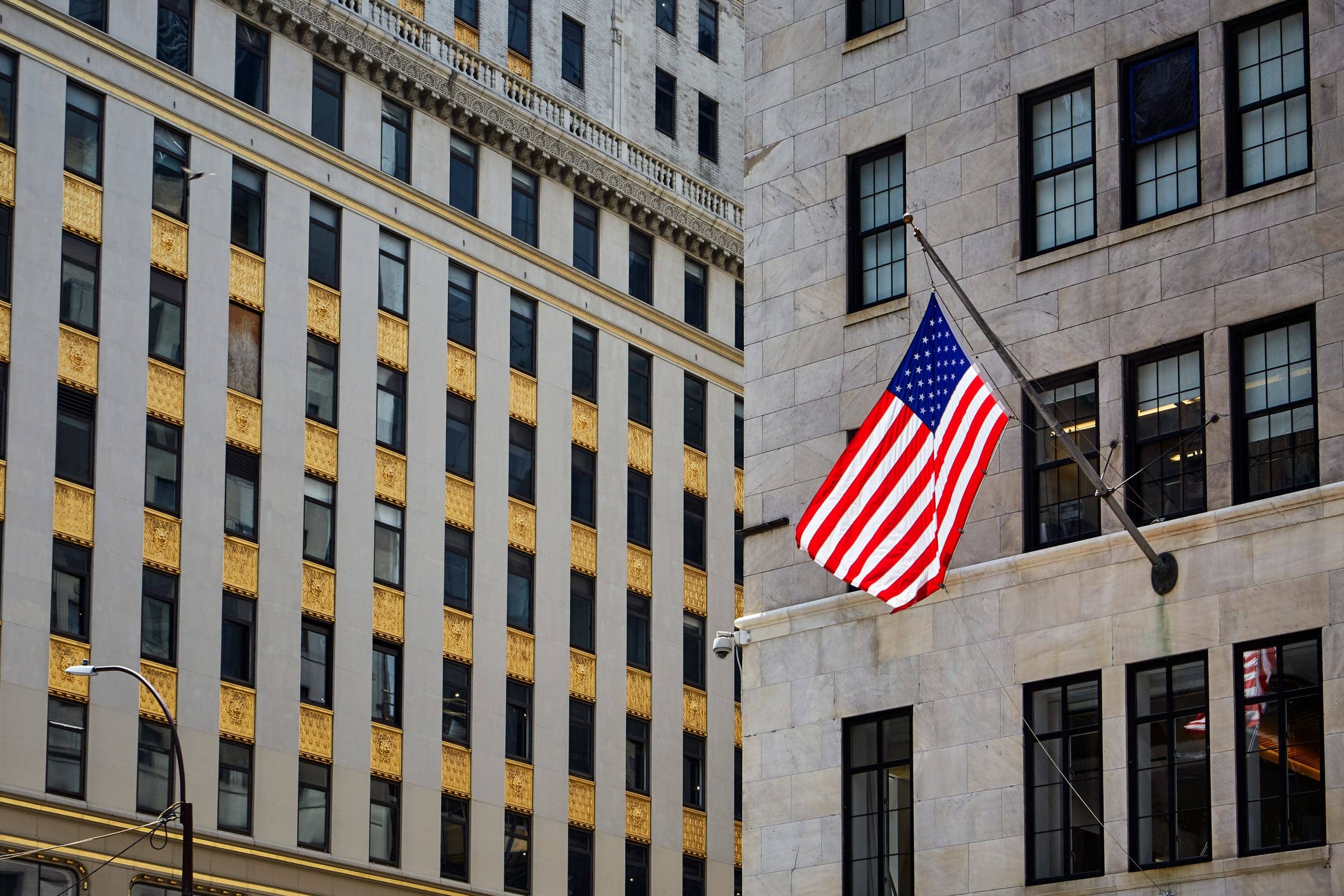 American flag on a civic building representing public-sector organizations